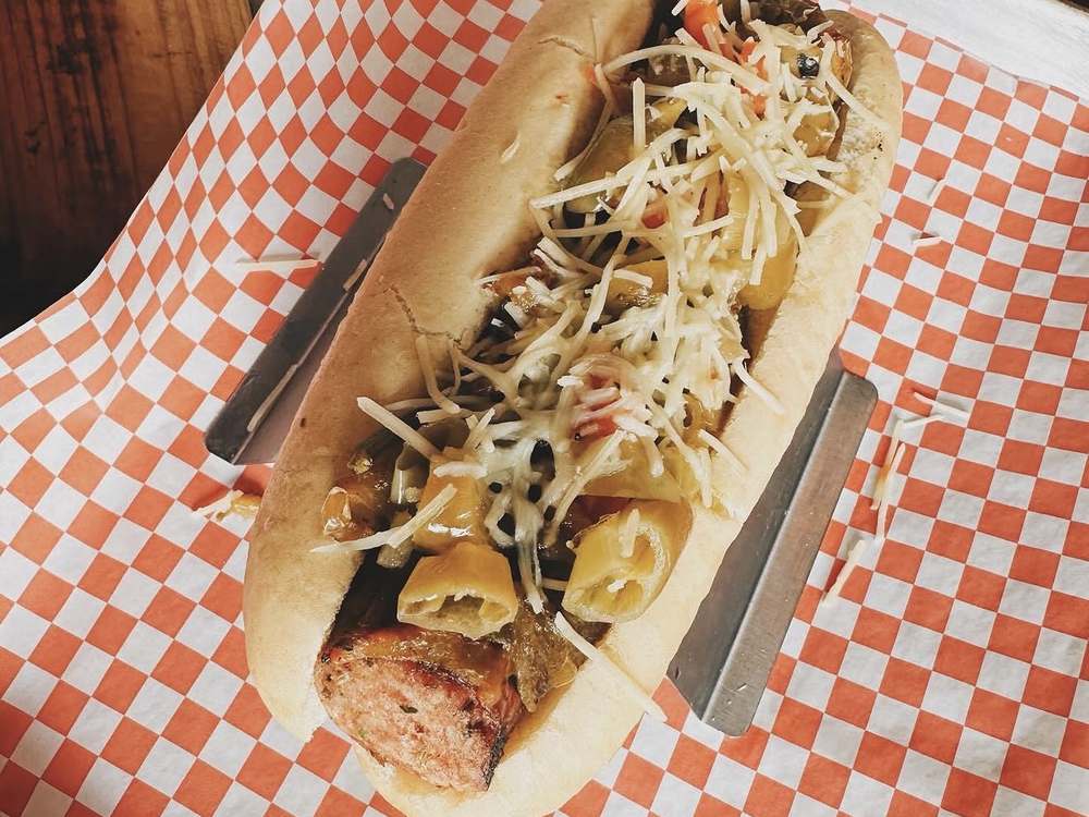 Italian sausage with hot giardiniera, sweet peppers and Parmesan at Wurst Behavior